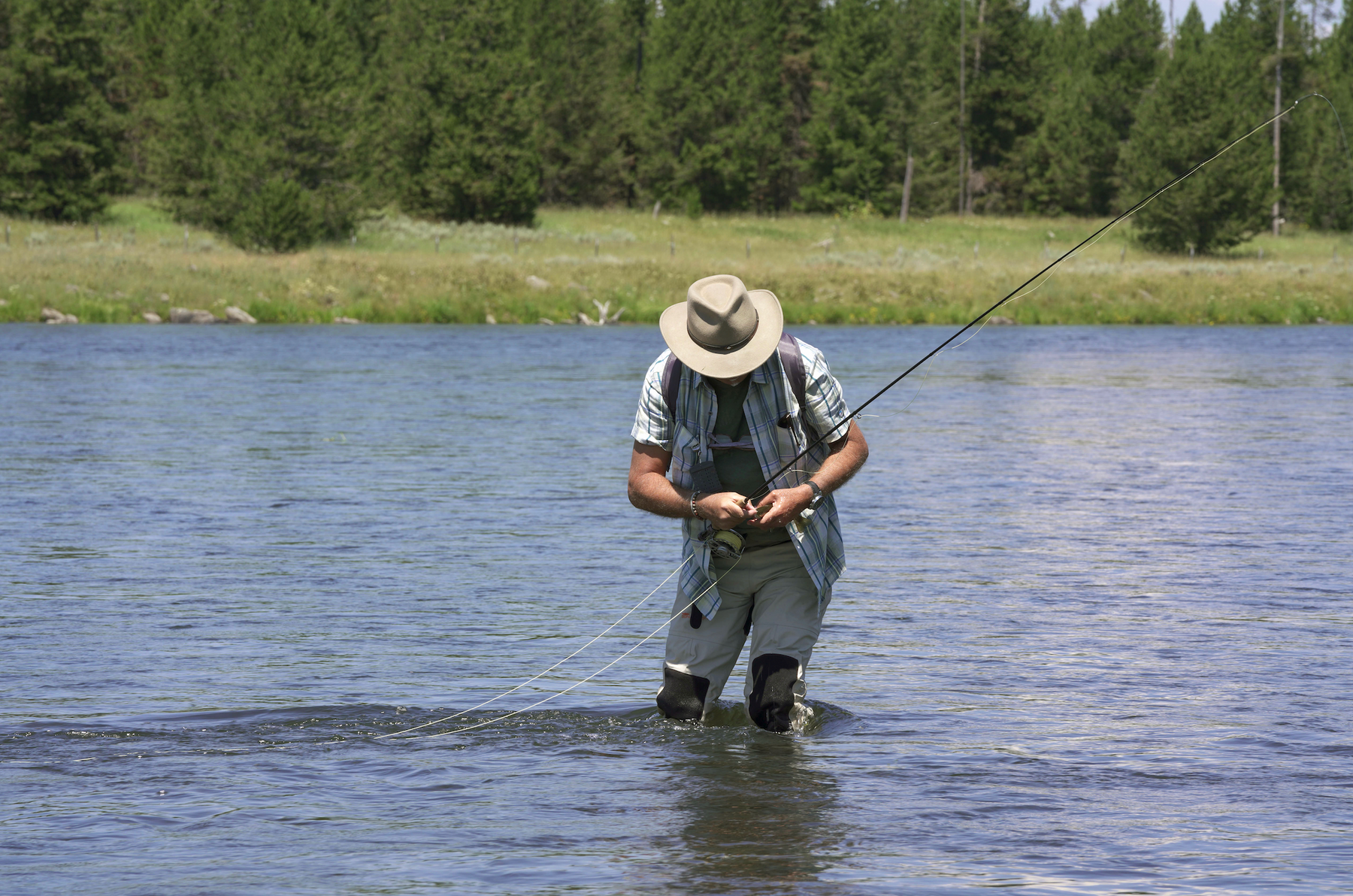 What to Wear Fishing For All Seasons (On Shore & On Boat)