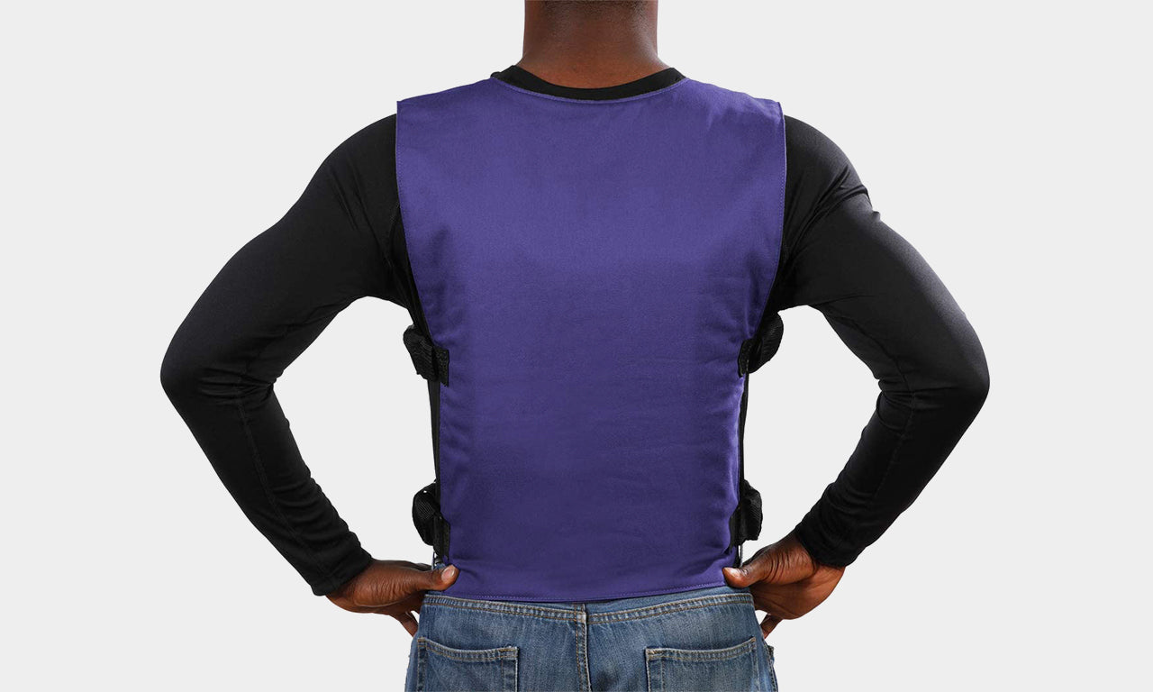 Model wearing Banox® FR3 Vest Set in blue and showing back of vest